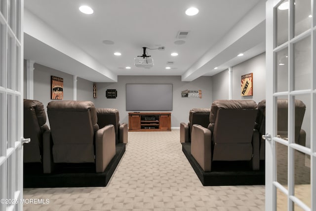 home theater featuring french doors, visible vents, and recessed lighting