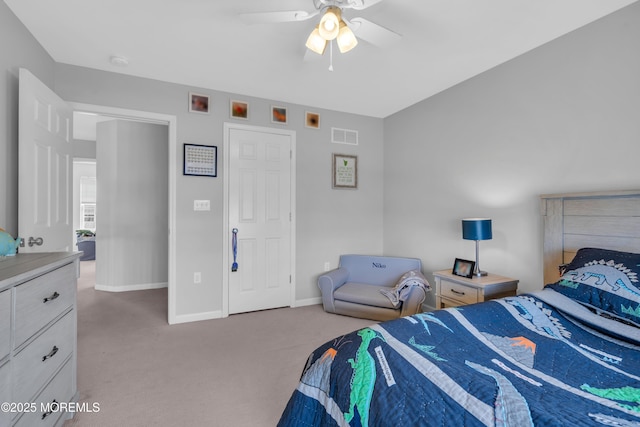 bedroom featuring carpet floors, visible vents, baseboards, and a ceiling fan