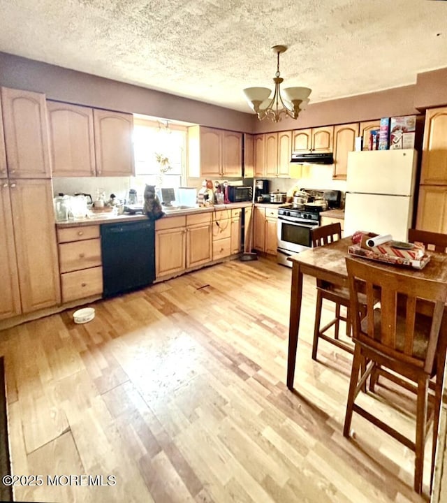 kitchen featuring black appliances, light wood-style flooring, light brown cabinets, and light countertops