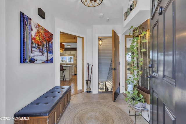 entryway featuring light tile patterned floors