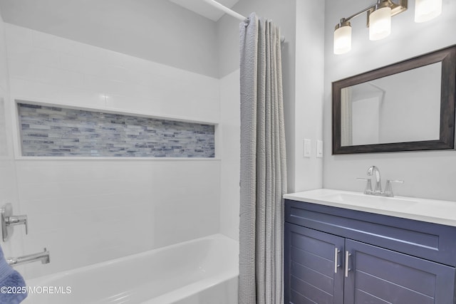 full bath with vanity and shower / bathtub combination with curtain