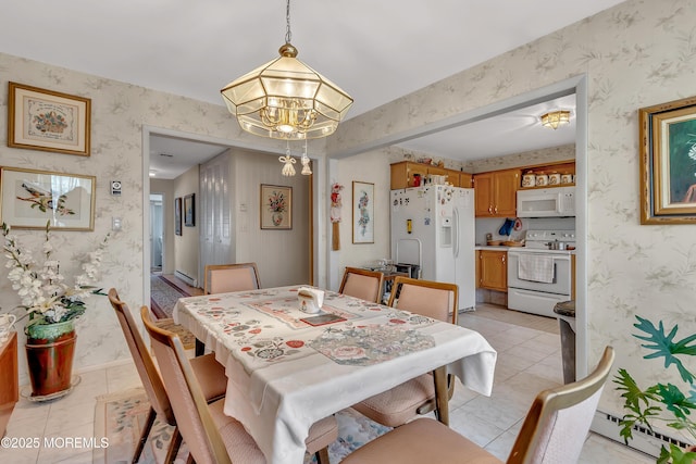 dining room with wallpapered walls, light tile patterned floors, baseboards, and a notable chandelier