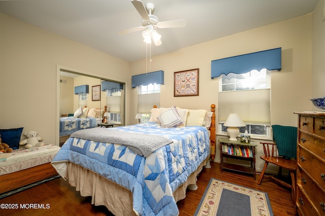 bedroom featuring a ceiling fan and wood finished floors