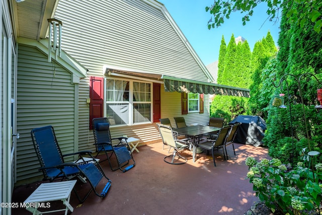 view of patio / terrace featuring outdoor dining space and area for grilling