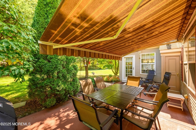 view of patio with outdoor dining area