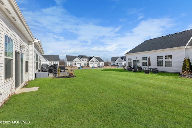 view of yard featuring a residential view