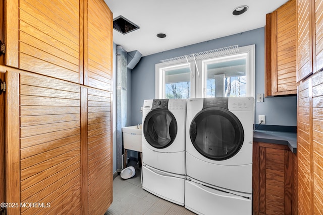 washroom featuring separate washer and dryer