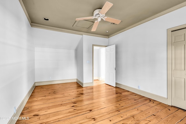 unfurnished bedroom with hardwood / wood-style floors, ceiling fan, baseboards, and crown molding