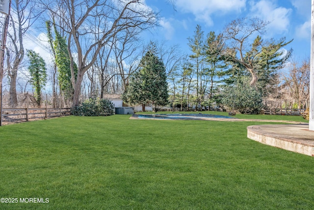 view of yard featuring fence