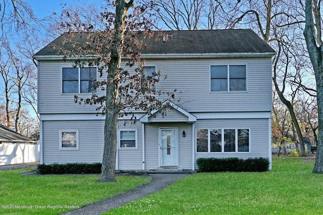 view of front of house with a front lawn