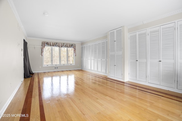 1759 Todd Rd, Toms River, NJ 08755 - unfurnished living room with wood finished floors, ornamental molding, and baseboards
