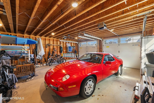 garage featuring a garage door opener