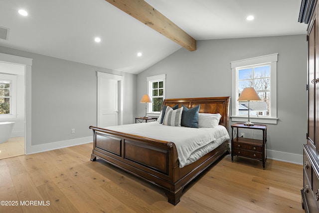 bedroom with multiple windows, light wood-style flooring, and lofted ceiling with beams