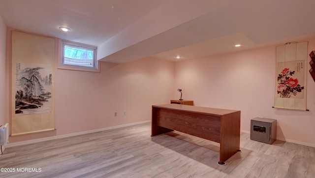 interior space with light wood finished floors, recessed lighting, and baseboards