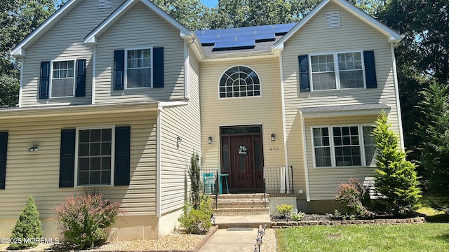 traditional home with solar panels