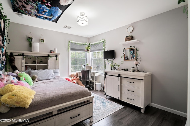 bedroom with visible vents, baseboards, and dark wood-style floors