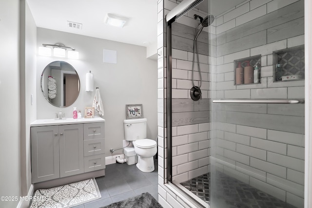 bathroom with tile patterned floors, toilet, visible vents, and a stall shower