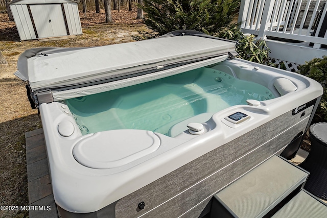 exterior details featuring a hot tub