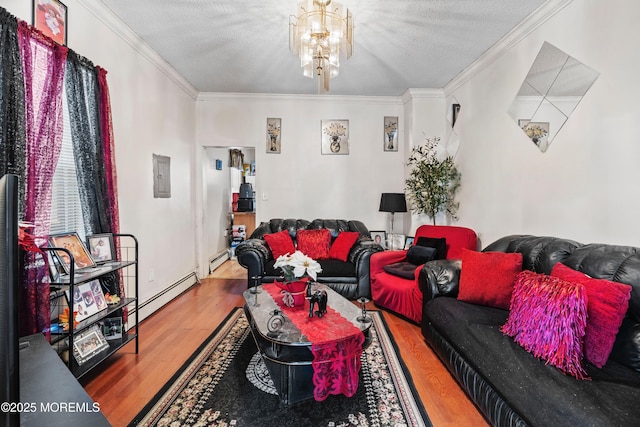 living room featuring a textured ceiling, a baseboard radiator, a notable chandelier, wood finished floors, and crown molding