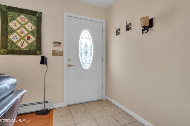 foyer entrance featuring baseboards, baseboard heating, and light tile patterned floors