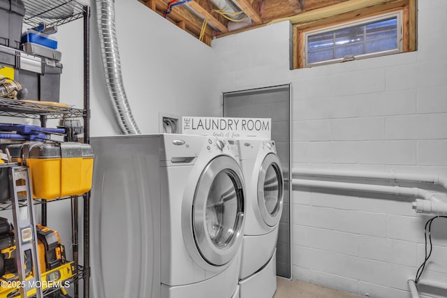 clothes washing area featuring laundry area and independent washer and dryer