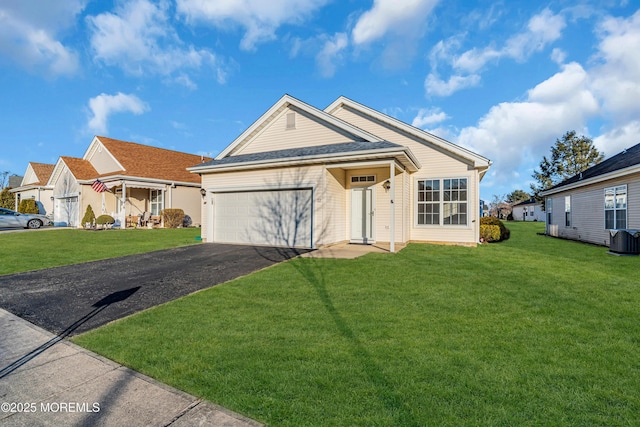 ranch-style home featuring a garage, aphalt driveway, a front yard, and central air condition unit