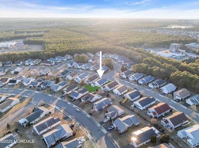 birds eye view of property with a residential view