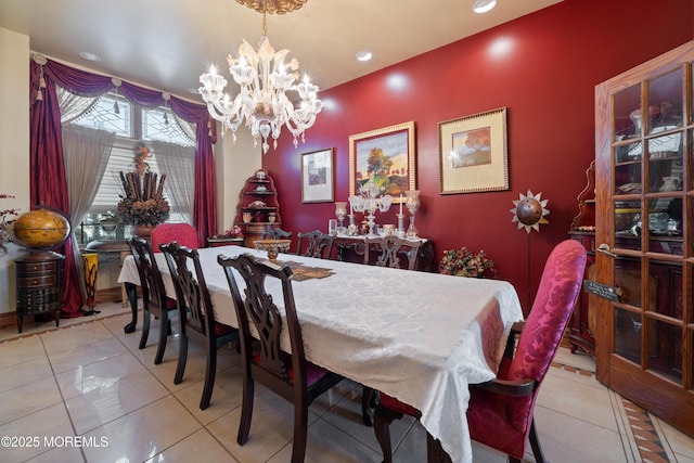 dining area with a chandelier, tile patterned flooring, and recessed lighting