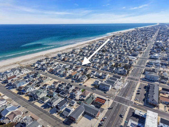 aerial view featuring a beach view and a water view