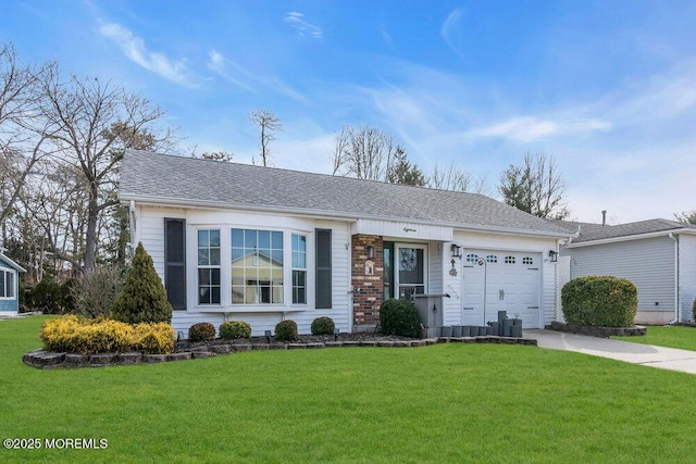 ranch-style home featuring brick siding, a garage, concrete driveway, and a front lawn