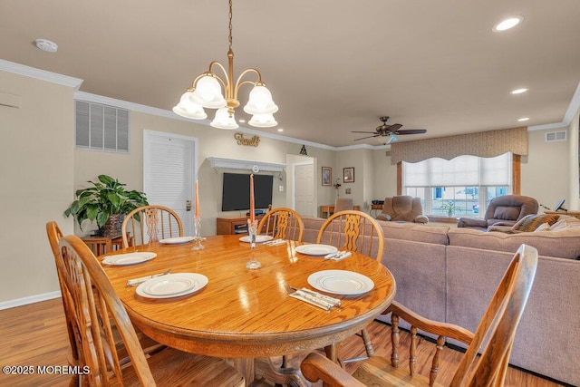 dining room featuring visible vents, recessed lighting, crown molding, and light wood-type flooring