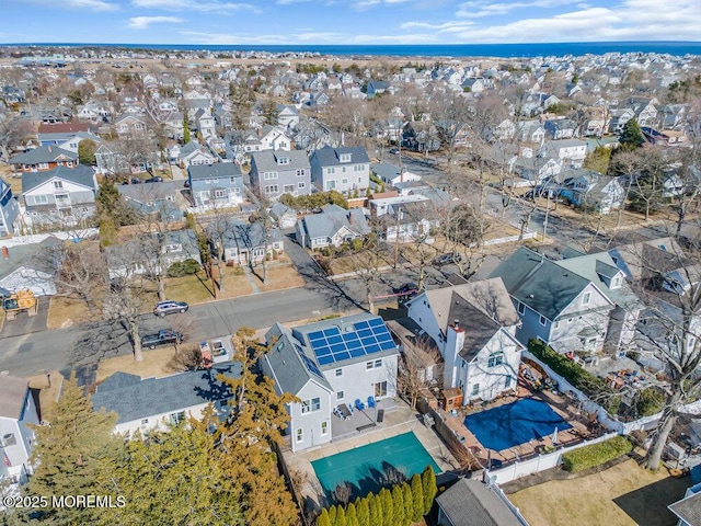 birds eye view of property with a residential view