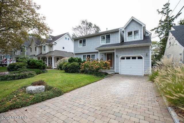 view of front facade with a garage, a front lawn, and decorative driveway