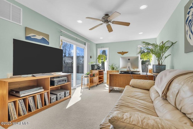 living area featuring carpet floors, recessed lighting, visible vents, and ceiling fan