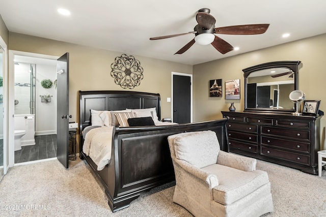 bedroom with ceiling fan, baseboards, ensuite bathroom, and recessed lighting