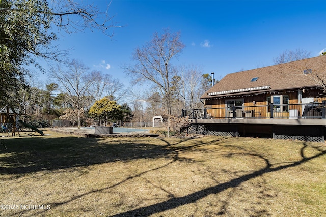 view of yard with a deck