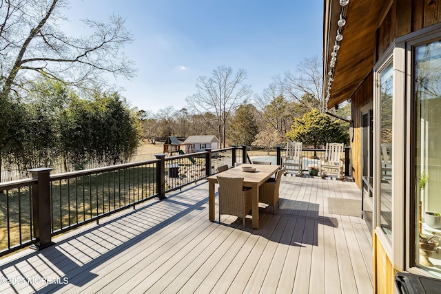 deck featuring an outbuilding