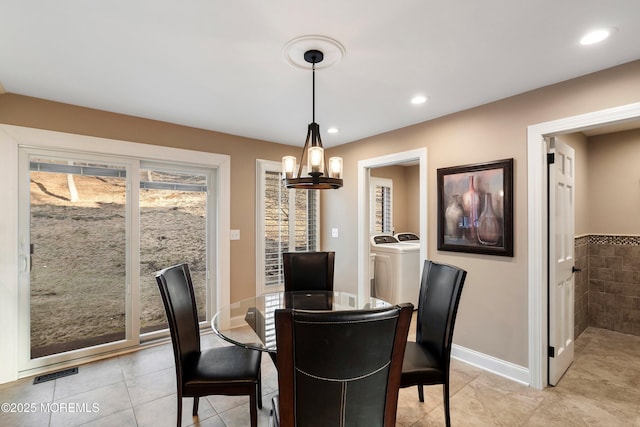 dining room featuring light tile patterned floors, recessed lighting, separate washer and dryer, visible vents, and baseboards