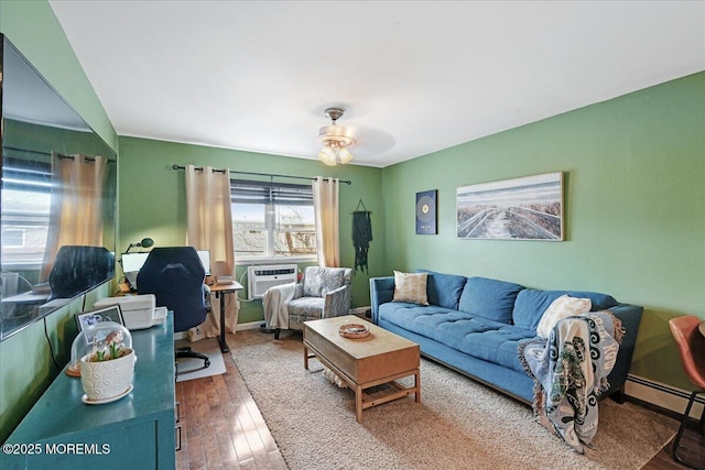 living area with cooling unit, wood-type flooring, ceiling fan, and baseboard heating