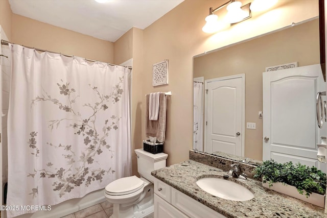 full bath with toilet, shower / tub combo, tile patterned flooring, and vanity