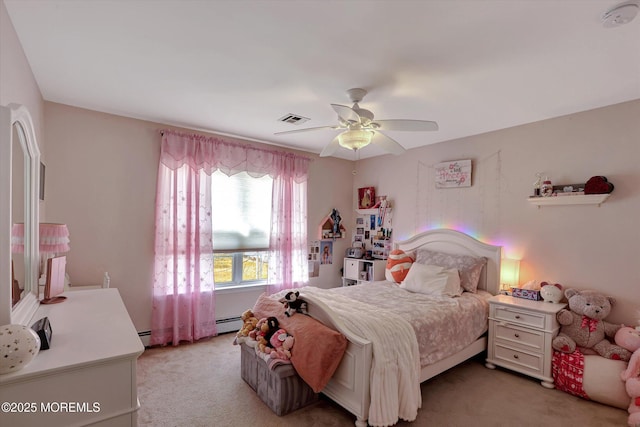 bedroom featuring a baseboard heating unit, visible vents, ceiling fan, and light carpet