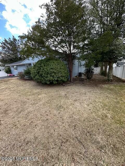 view of yard featuring fence