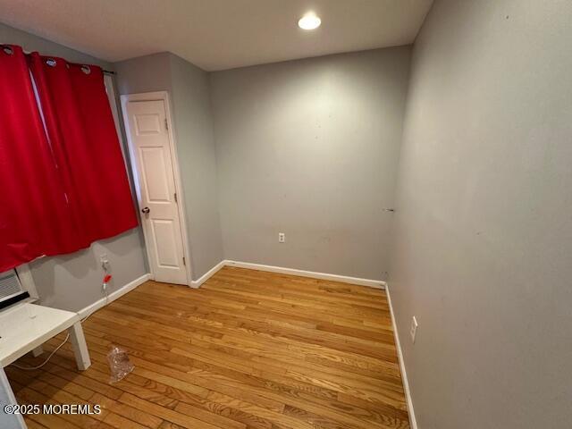 32 Cooper Ave, West Long Branch, NJ 07764 - spare room with baseboards, recessed lighting, and wood finished floors