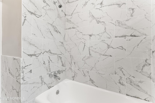 bathroom featuring shower / washtub combination