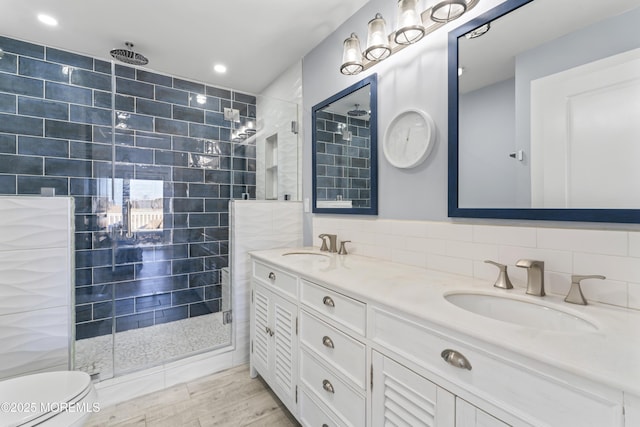 45 Royal Dr, Brick, NJ 08723 - bathroom with a walk in shower, double vanity, recessed lighting, and wood finished floors