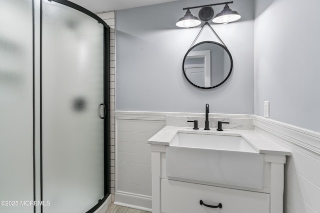45 Royal Dr, Brick, NJ 08723 - full bathroom with a stall shower, vanity, and a wainscoted wall