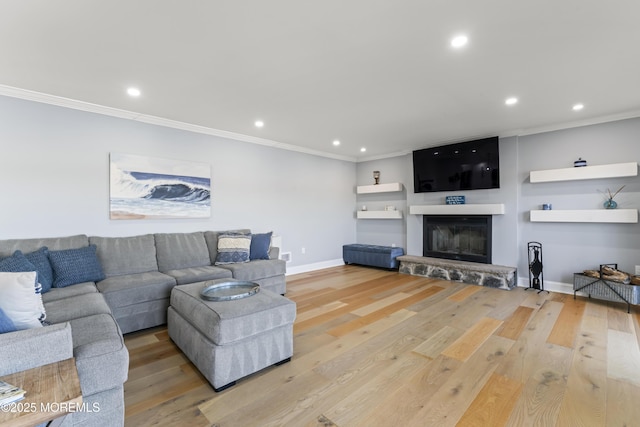 45 Royal Dr, Brick, NJ 08723 - living room featuring ornamental molding, recessed lighting, wood finished floors, and a glass covered fireplace