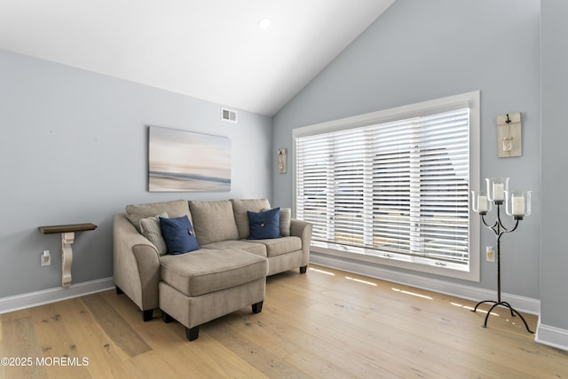 45 Royal Dr, Brick, NJ 08723 - living room featuring vaulted ceiling and light wood-style flooring