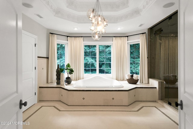 full bathroom with a shower stall, visible vents, a tray ceiling, and crown molding