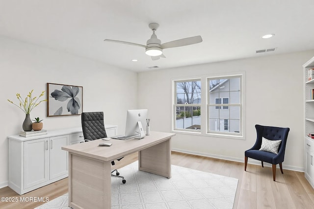 office area with recessed lighting, visible vents, ceiling fan, light wood-type flooring, and baseboards